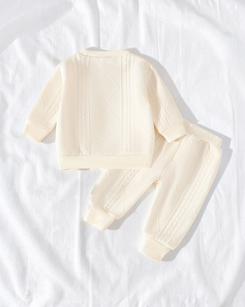 Ensemble Le Cocon d'Or pour bébé composé d'un haut à manches longues et d'un pantalon en maille crème texturée