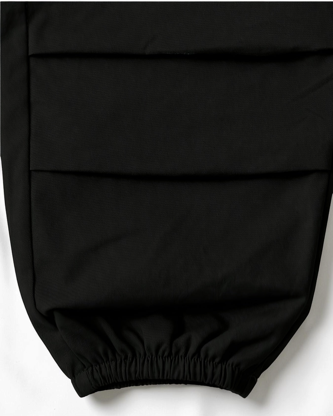 Pantalon décontracté noir en coton pour fille Le Cocon d'Or avec poignets élastiques et poches latérales