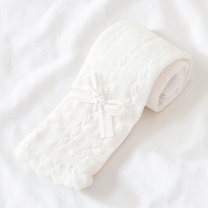 Collant blanc Le Cocon d'Or pour fille en maille respirante avec motif torsadé et petit nœud décoratif