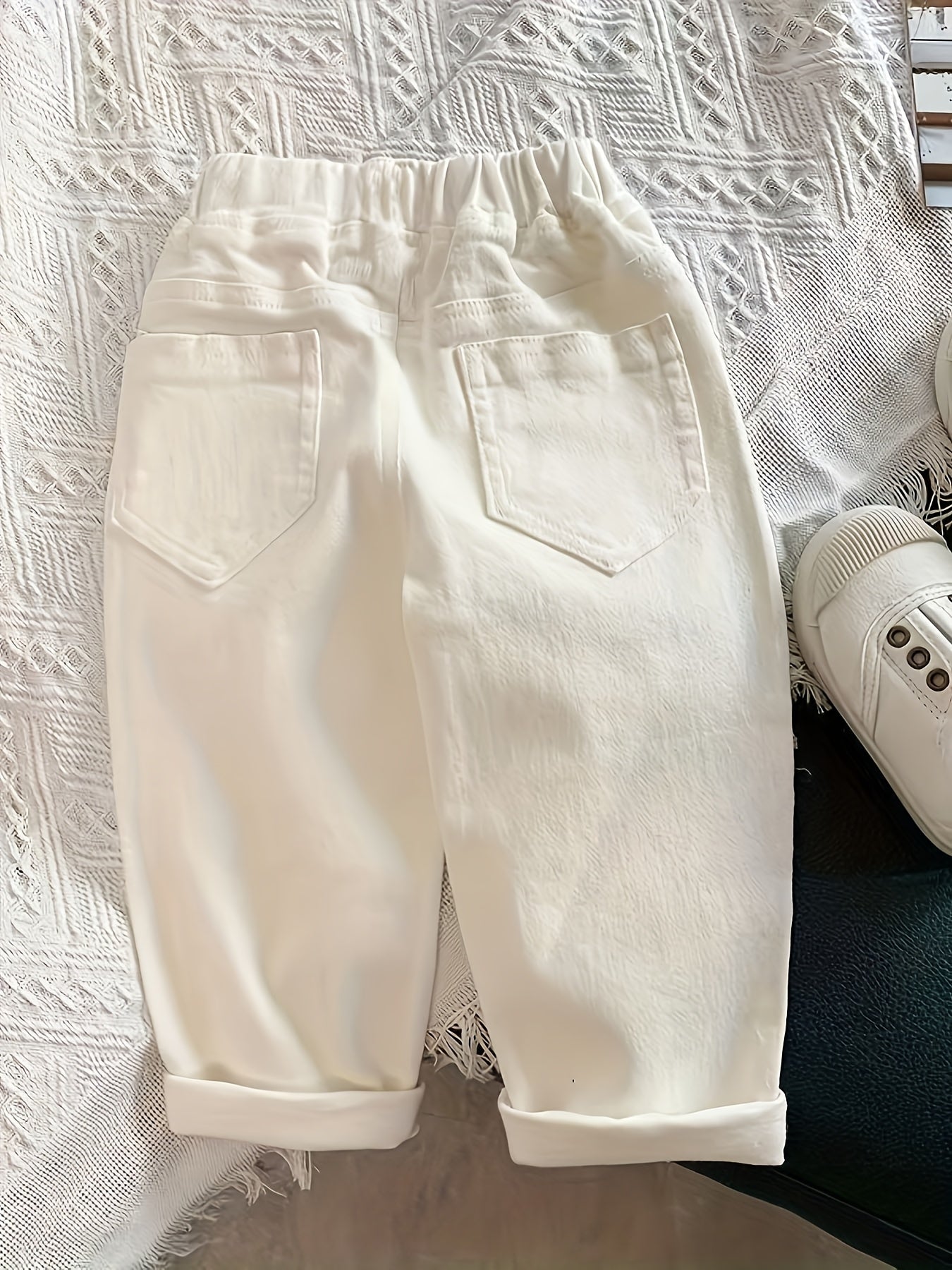 Pantalon décontracté blanc pour petits et moyens (les tailles sont plus grandes, veuillez vous référer au tableau des tailles pour passer une commande) Nouvelle version coréenne printemps-été de pantalons longs à la mode pour garçons et filles, pantalons