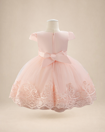 Robe de cérémonie Le Cocon d'Or rose pour bébé fille avec jupe en tulle brodé, manches papillon et nœud au dos