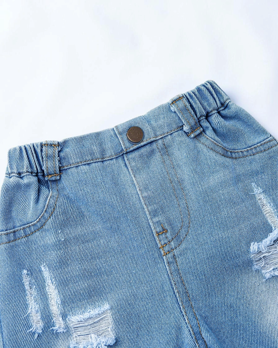 Pantalons en jean bleu Le Cocon d'Or pour petite fille avec détails déchirés et taille élastique confortable