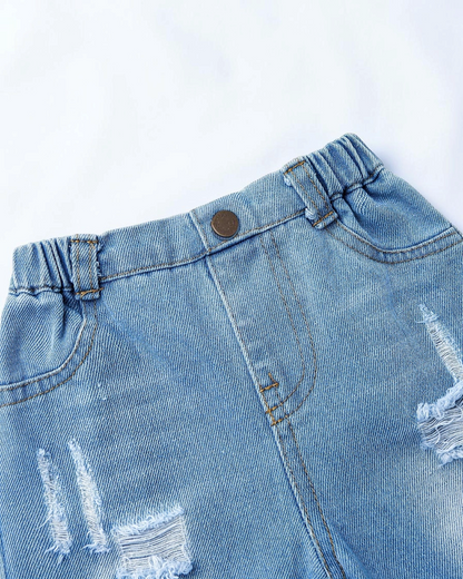 Pantalons en jean bleu Le Cocon d'Or pour petite fille avec détails déchirés et taille élastique confortable