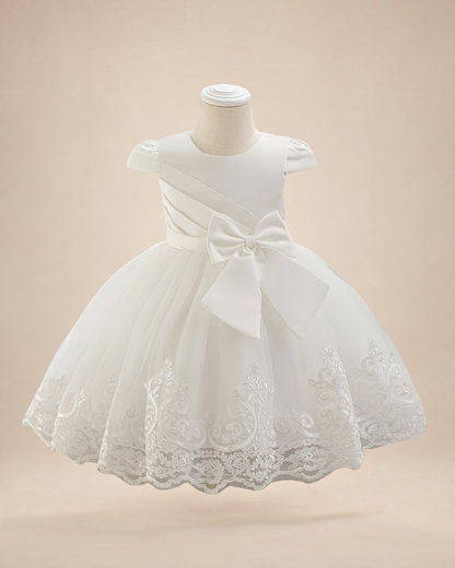 Robe de cérémonie Le Cocon d'Or pour bébé fille en tulle blanc avec broderies florales, manches volantées et nœud