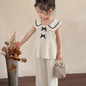 Ensemble 2 pièces pour petites filles, haut sans manches à col Peter Pan avec volants + pantalon large à texture, tenue décontractée d'été, ensemble de pantalons longs à la mode et ludiques pour filles, convient pour les sorties, les séances photo et les