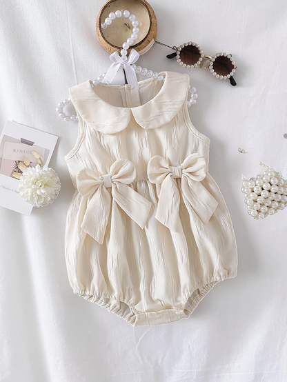 Combinaison d'été Le Cocon d'Or pour bébé fille en polyester beige avec col claudine et nœuds décoratifs