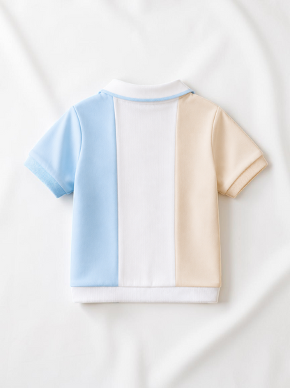 Polo Le Cocon d'Or pour bébé garçon à manches courtes, design color-block bleu, blanc et beige en maille respirante.