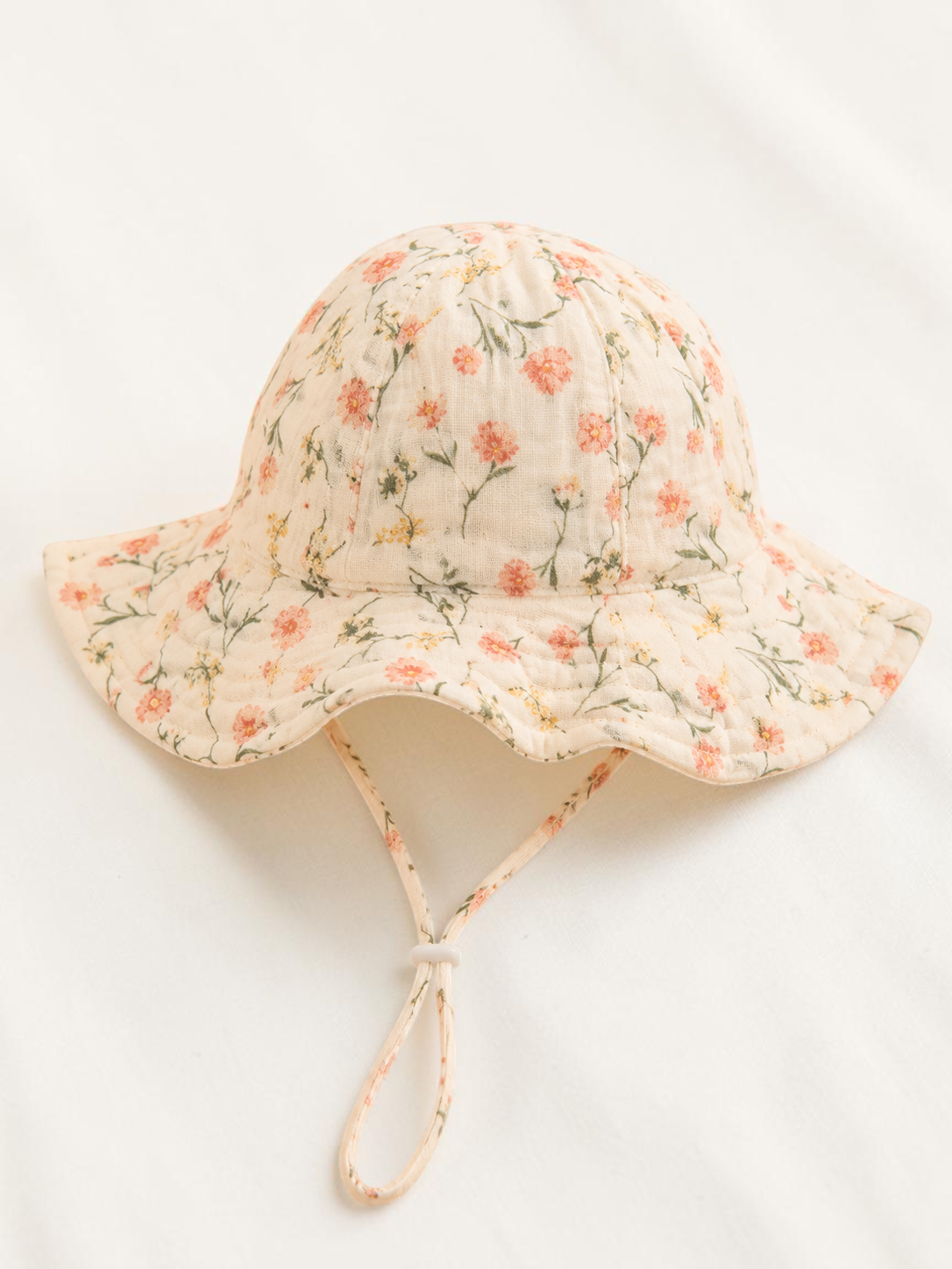 Bob pour bébé Le Cocon d'Or en coton doux avec motif floral coloré et cordon de serrage pour le printemps et l'été