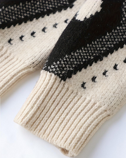 Manche de pull Le Cocon d'Or pour garçon en maille épaisse beige et noire avec motif géométrique rétro
