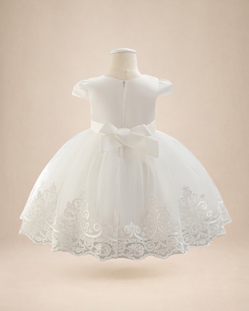 Robe de cérémonie Le Cocon d'Or pour bébé fille en tulle blanc avec broderies florales, manches volantées et nœud