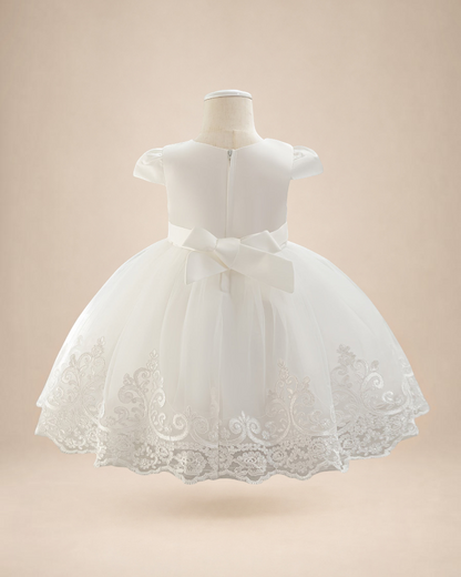 Robe de cérémonie Le Cocon d'Or pour bébé fille en tulle blanc avec broderies florales, manches volantées et nœud