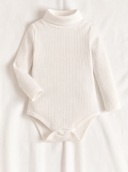 Barboteuse bébé fille Le Cocon d'Or en coton blanc côtelé à col roulé et manches longues, style élégant et thermique