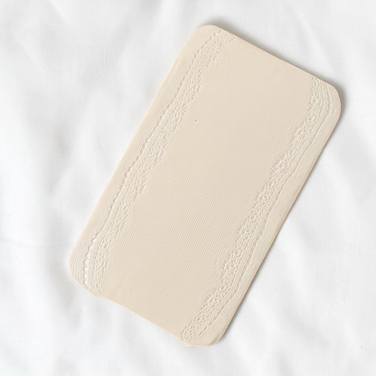 Collant Le Cocon d'Or pour fille en tricot blanc beige avec motif texturé et détails élégants style princesse