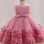 Une robe de princesse sans manches pour bébés filles avec des fleurs tridimensionnelles, du tulle moelleux et des broderies de perles, idéale pour les fêtes de premier anniversaire, les bals de promo et les cérémonies de mariage
