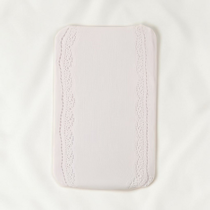 Collant Le Cocon d'Or pour fille en tricot blanc beige avec détails en dentelle et motif cœur sur le côté
