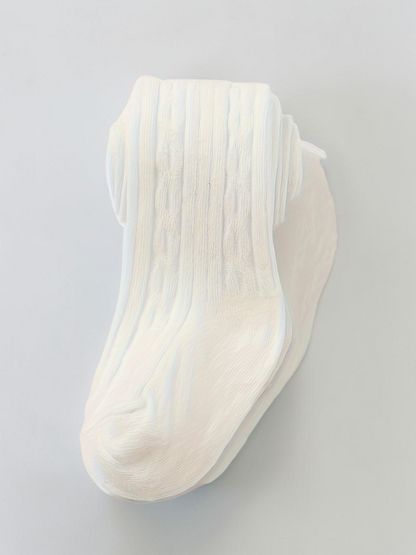 Collants blancs en maille pour bébé fille Le Cocon d'Or avec motif géométrique discret et coupe skinny