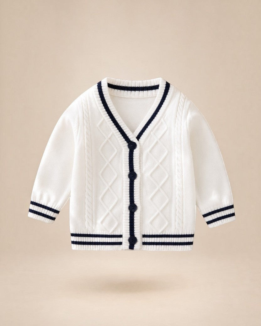 Gilet en maille Le Cocon d'Or blanc à col en V avec bordures contrastées bleu marine et boutons pour bébé garçon