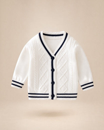 Gilet en maille Le Cocon d'Or blanc à col en V avec bordures contrastées bleu marine et boutons pour bébé garçon