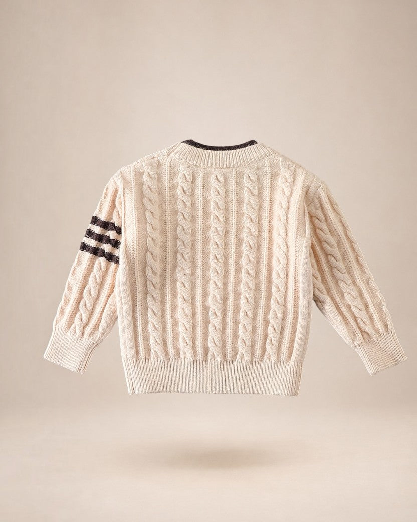 Pull en maille torsadée Le Cocon d'Or beige pour garçon avec rayures contrastantes sur la manche et col rond