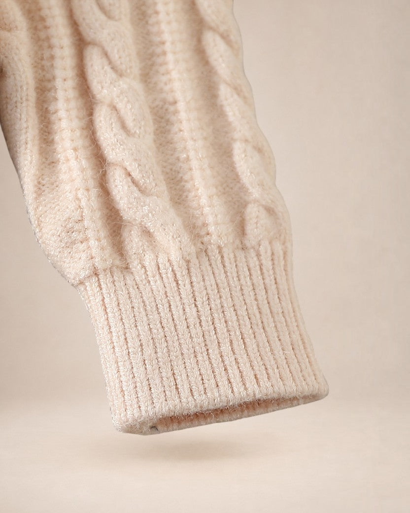 Manche de pull en maille torsadée beige Le Cocon d'Or avec poignet côtelé pour enfant