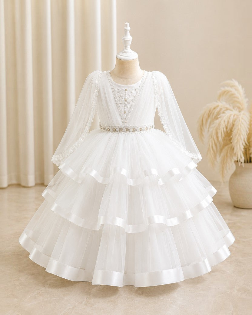 Robe midi blanche Le Cocon d'Or pour fille avec manches bouffantes, détails en perles et jupe en tulle évasée.